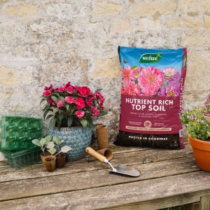 westland nutrient rich top soil on potting bench